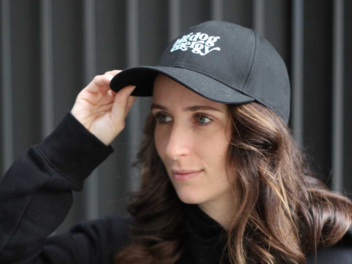 Woman wearing branded baseball cap - Big Dog Energy