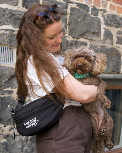 Girl wearing a bumbag and holding a caboodle